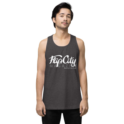 A man wearing a gray sleeveless tank top with white text 'Flip City Magazine' printed on the front.