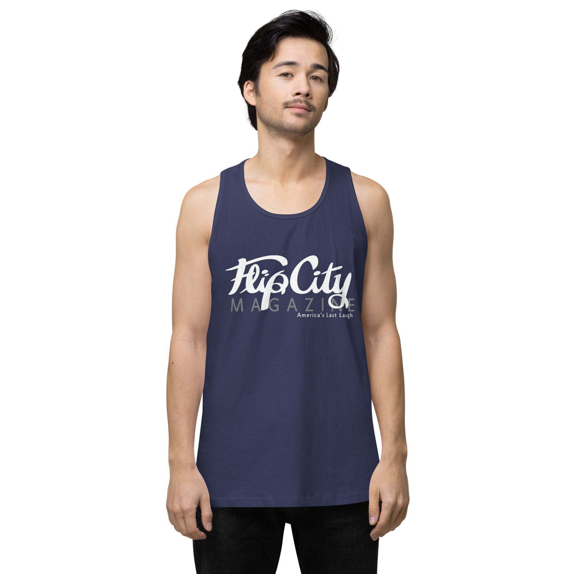 A man wearing a blue sleeveless tank top with white text 'Flip City Magazine' printed on the front.