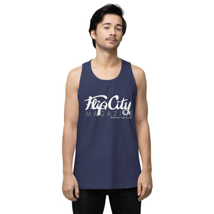 A man wearing a blue sleeveless tank top with white text 'Flip City Magazine' printed on the front.