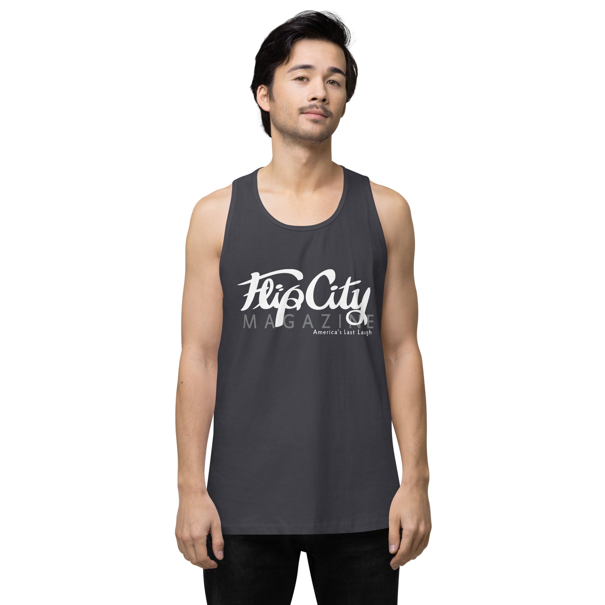 A man wearing a grey sleeveless tank top with white text 'Flip City Magazine' printed on the front.