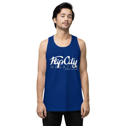 A man wearing a blue sleeveless tank top with white text 'Flip City Magazine' printed on the front.