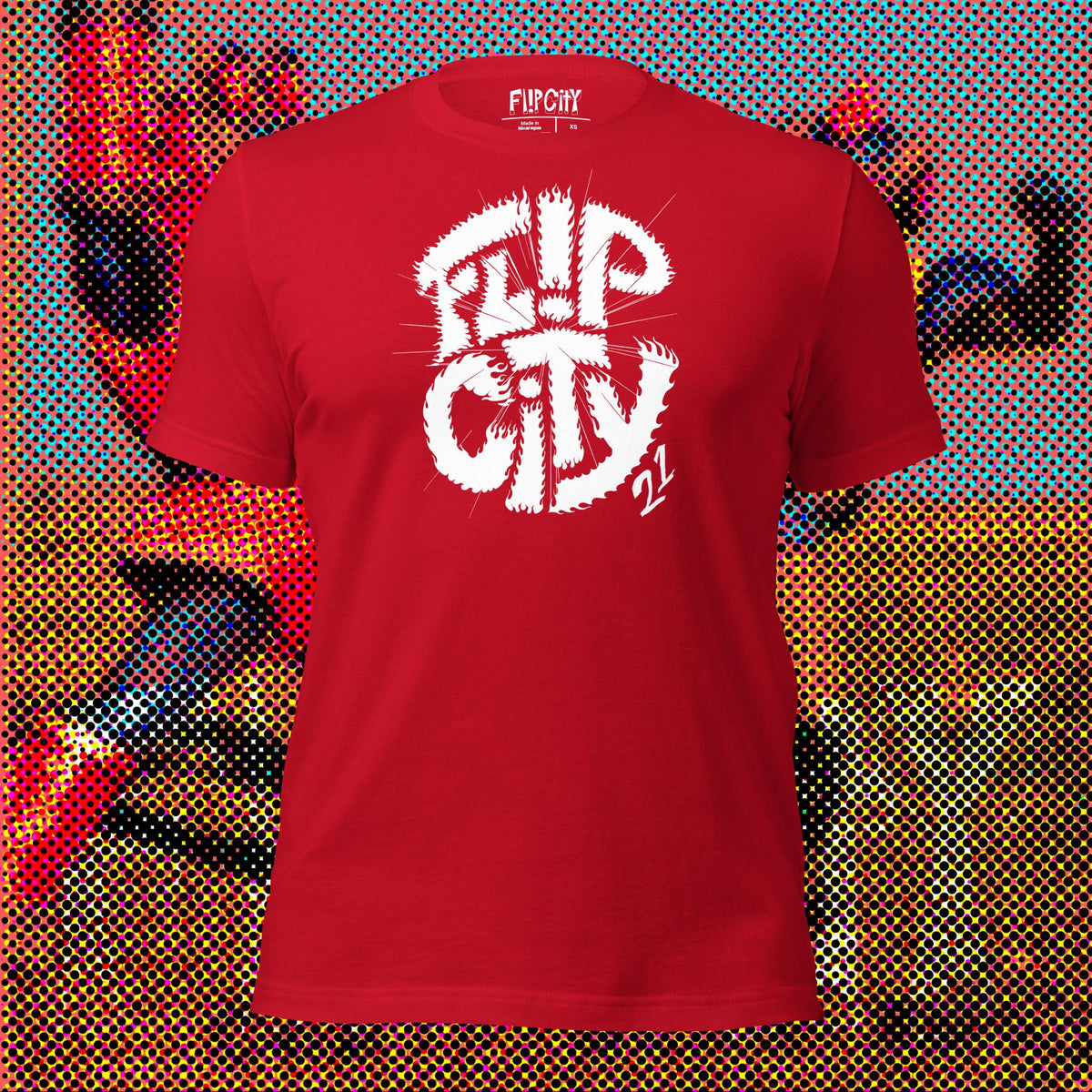 A red t-shirt with 'Flip City' text and a graphic design, displayed against a colorful comic book-style background.