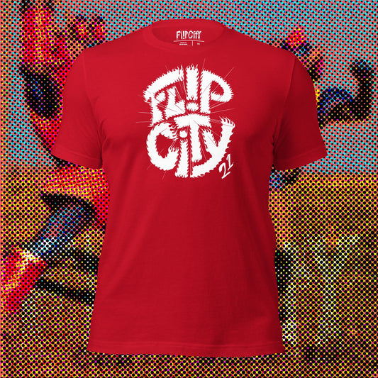 A red t-shirt with 'Flip City' text and a graphic design, displayed against a colorful comic book-style background.