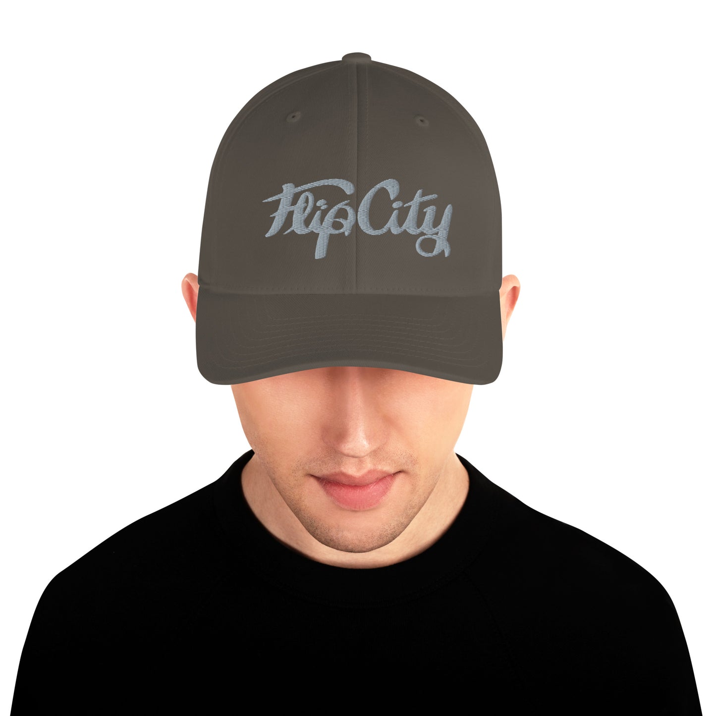Suggestion

A man wearing a PALE GREEN KHAKI structured twill cap with 'Flip City' embroidery.